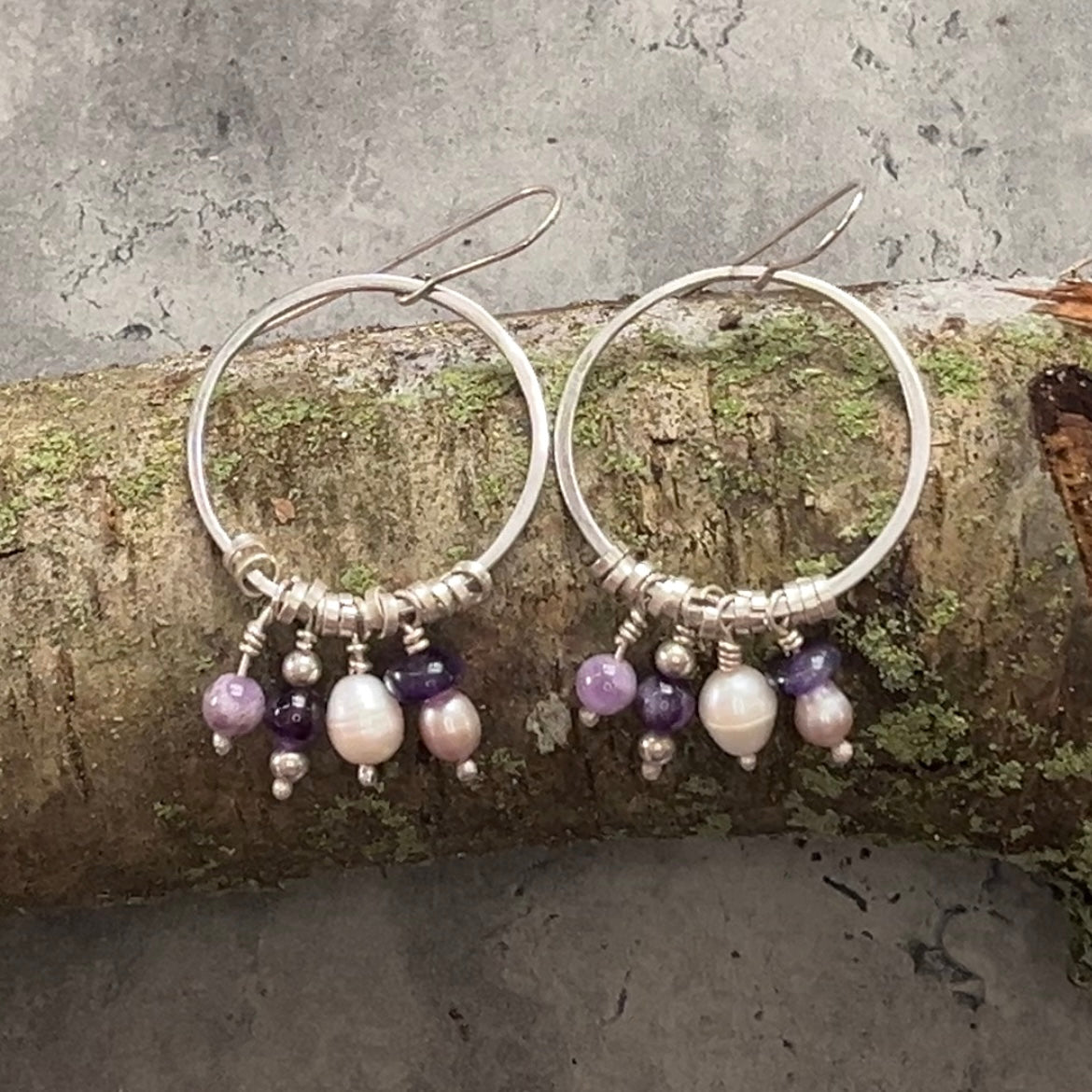 Boho silver hoops with dangling beads of amethyst and pearl, and small silvver rings.  Very fun and swingy.